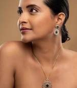 gold plated green stone necklace set with matching earrings