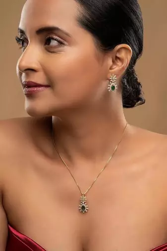 Gold plated green stone pendant necklace set in sterling silver