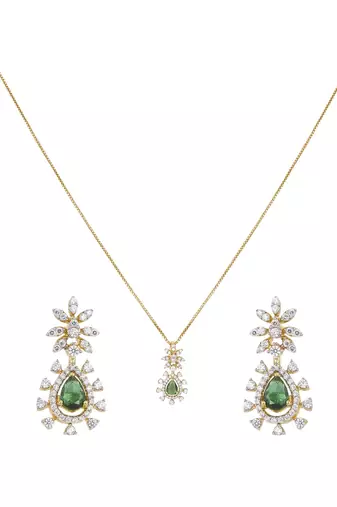 gold plated pendant set with green stone accent