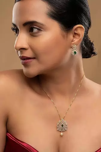 Gold plated green stone pendant necklace set in sterling silver