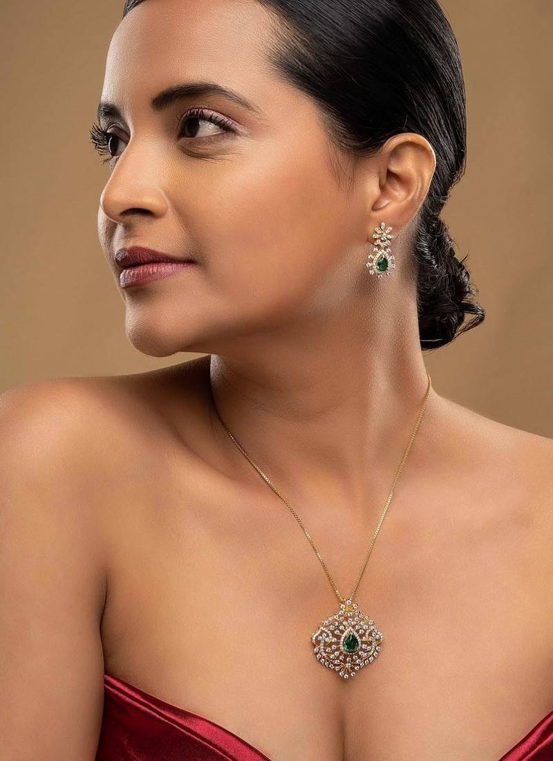 Gold plated green stone pendant necklace set in sterling silver