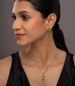 green stone pendant set with gold plated finish