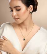 green stone pendant necklace set with gold plating