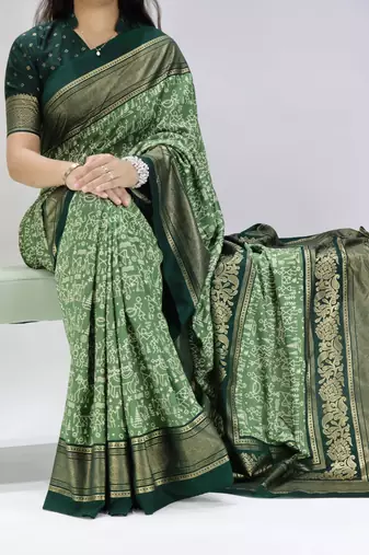 pista color  printed with foil work and contrast border  soft tussar silk saree with unstitched blouse