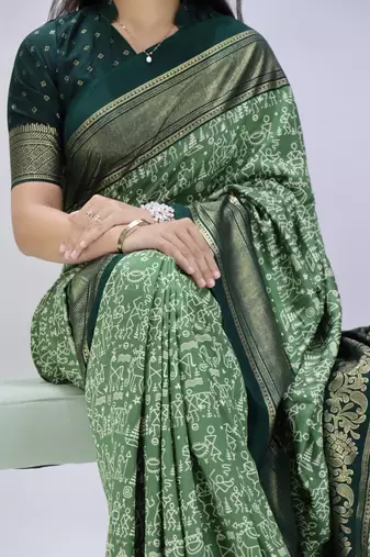 pista color  printed with foil work and contrast border  soft tussar silk saree with unstitched blouse