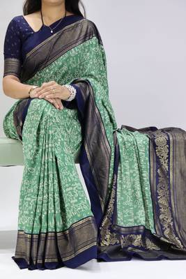 green color  printed with foil work and contrast border  soft tussar silk saree with unstitched blouse 1