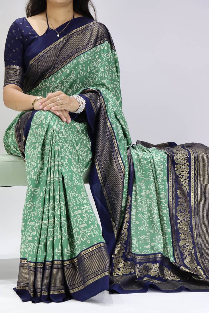 green color  printed with foil work and contrast border  soft tussar silk saree with unstitched blouse