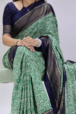 green color  printed with foil work and contrast border  soft tussar silk saree with unstitched blouse 2