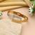 Gold color openable american diamond bracelet