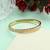 Gold color openable american diamond bracelet