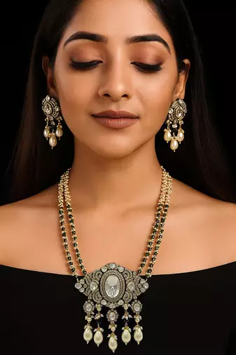Regal moissanite polki long necklace set with pearl & green bead detailing traditional gold finish jewelry by treemoda