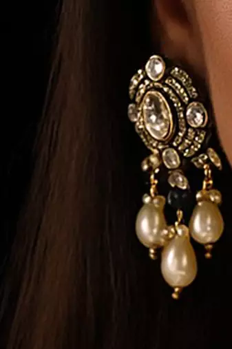 Regal moissanite polki long necklace set with pearl & green bead detailing traditional gold finish jewelry by treemoda