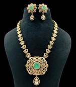 Royal necklace set with green stone centerpiece & matching earrings traditional gold finish jewelry by treemoda