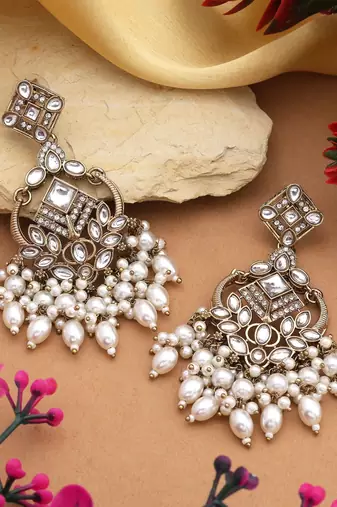 White color kundan earrings