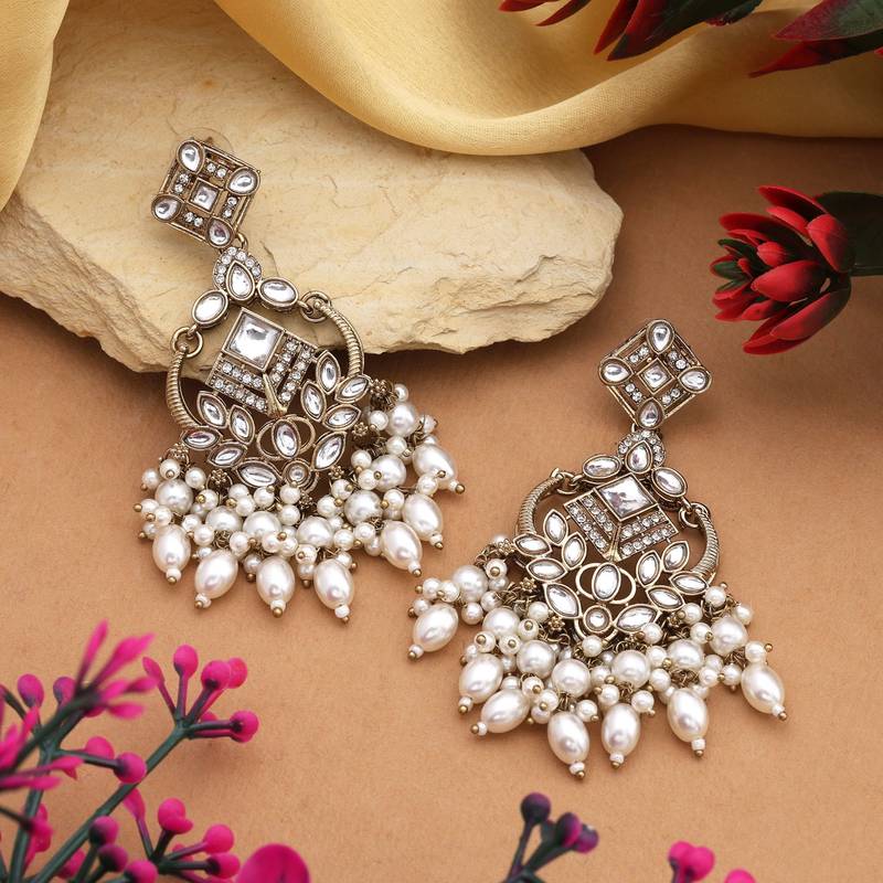 White color kundan earrings