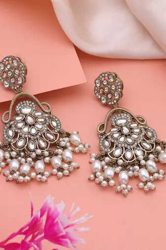 White color kundan earrings