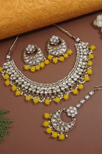 Gold plated traditional floral kundan pearl choker necklace jewelry earrings & maang tikka set for women (yellow)