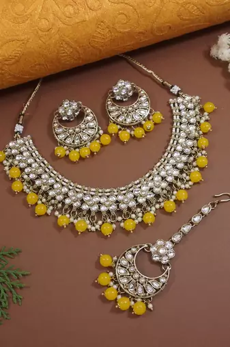 Gold plated traditional floral kundan pearl choker necklace jewelry earrings & maang tikka set for women (yellow)