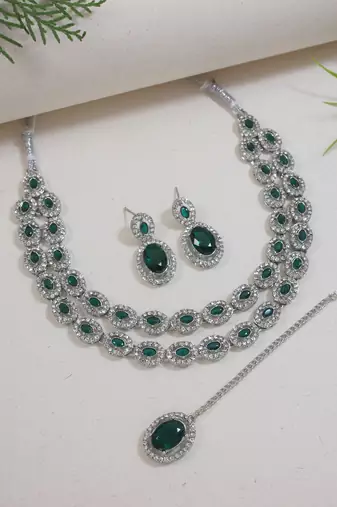Silver plated stylish design crystal diamond oval shape necklace with earrings & maang tikka jewellery set for women