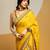 Yellow embroidered organza saree