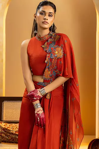 Red embroidered crepe saree