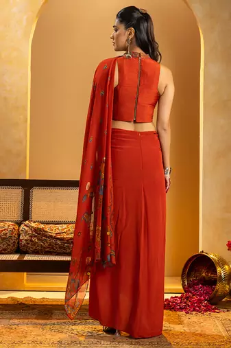 Red embroidered crepe saree