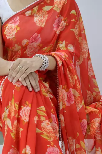 Orange color floral printed with pearl moti lace weightless saree with unstitched blouse