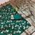 dark green zari woven art silk saree with blouse