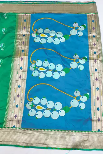 green zari woven art silk blend saree with blouse