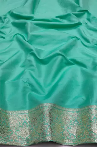 sea green zari woven art silk blend saree with blouse