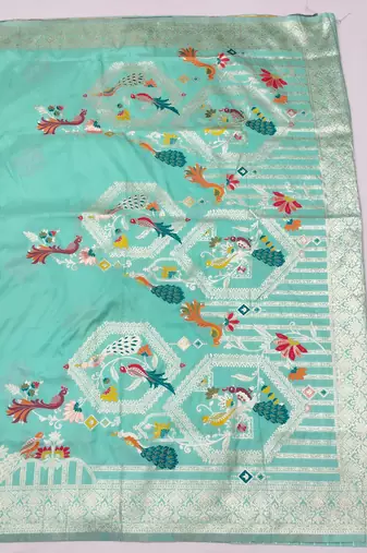 sea green zari woven art silk blend saree with blouse