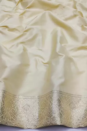 beige zari woven art silk blend saree with blouse
