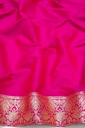 rani pink zari woven art silk blend saree with blouse