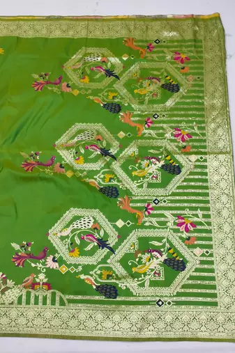 parrot green zari woven art silk blend saree with blouse