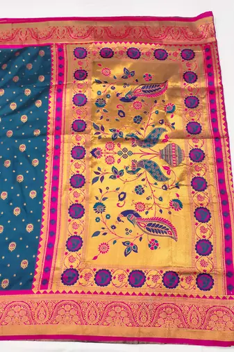 Firozi copper zari woven art silk blend saree with blouse