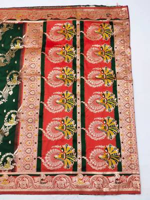 dark green zari woven art silk blend saree with blouse 3
