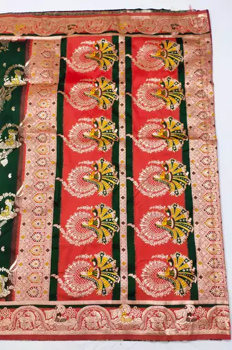 dark green zari woven art silk blend saree with blouse