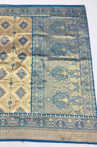 light beige zari woven kanjivaram silk blend saree with blouse