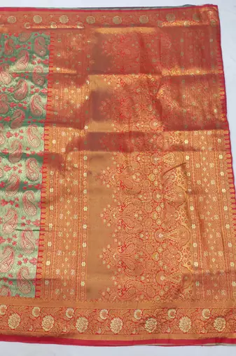 light orange zari woven kanjivaram silk blend saree with blouse