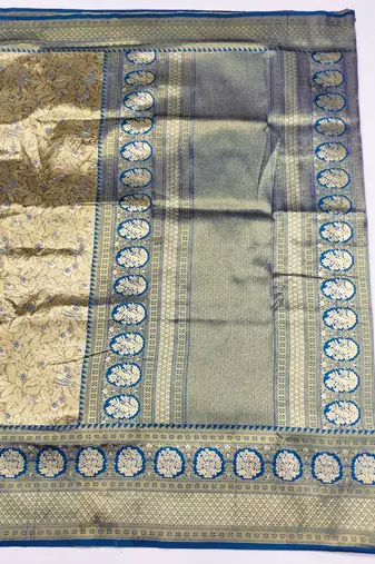 light beige zari woven kanjivaram silk blend saree with blouse