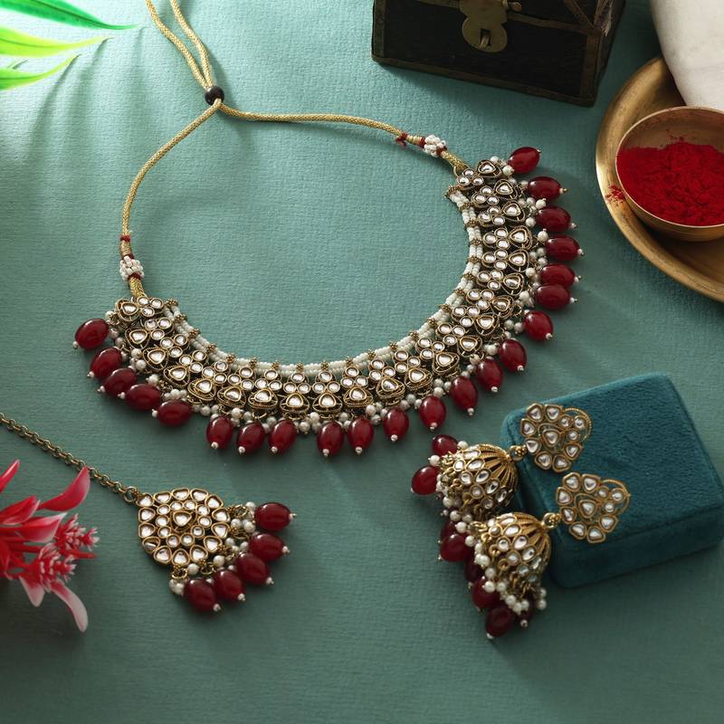 Maroon color kundan necklace set