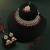 Maroon color kundan necklace set