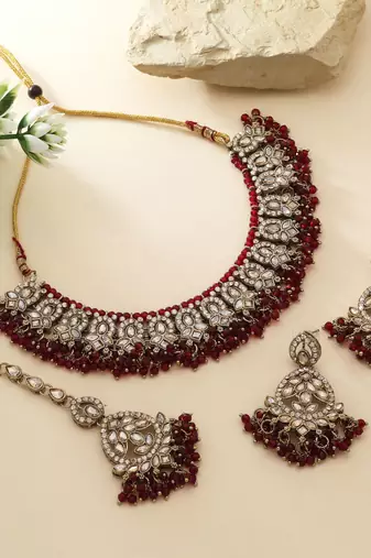Maroon color kundan necklace set