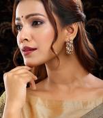 Gold plated kundan red stone earrings