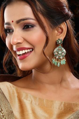 Gold plated kundan green stone dangler earrings