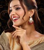 Gold plated kundan red stone dangler earrings