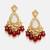 Gold plated kundan red stone dangler earrings