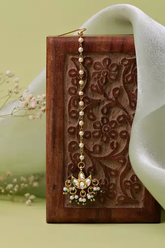 Gold plated kundan green stone maang tikka