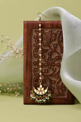 Gold plated kundan green stone maang tikka