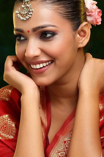 Gold plated kundan green stone maang tikka